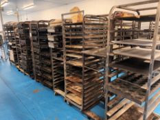 Ten various multi-tier steel baking trollies and trays