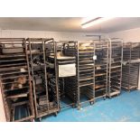 Fourteen various multi-tier steel baking trollies and trays