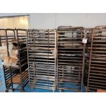 Eleven various multi-tier steel baking trollies and trays