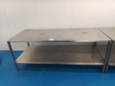 Stainless steel preparation table (approximately 8' x 2')