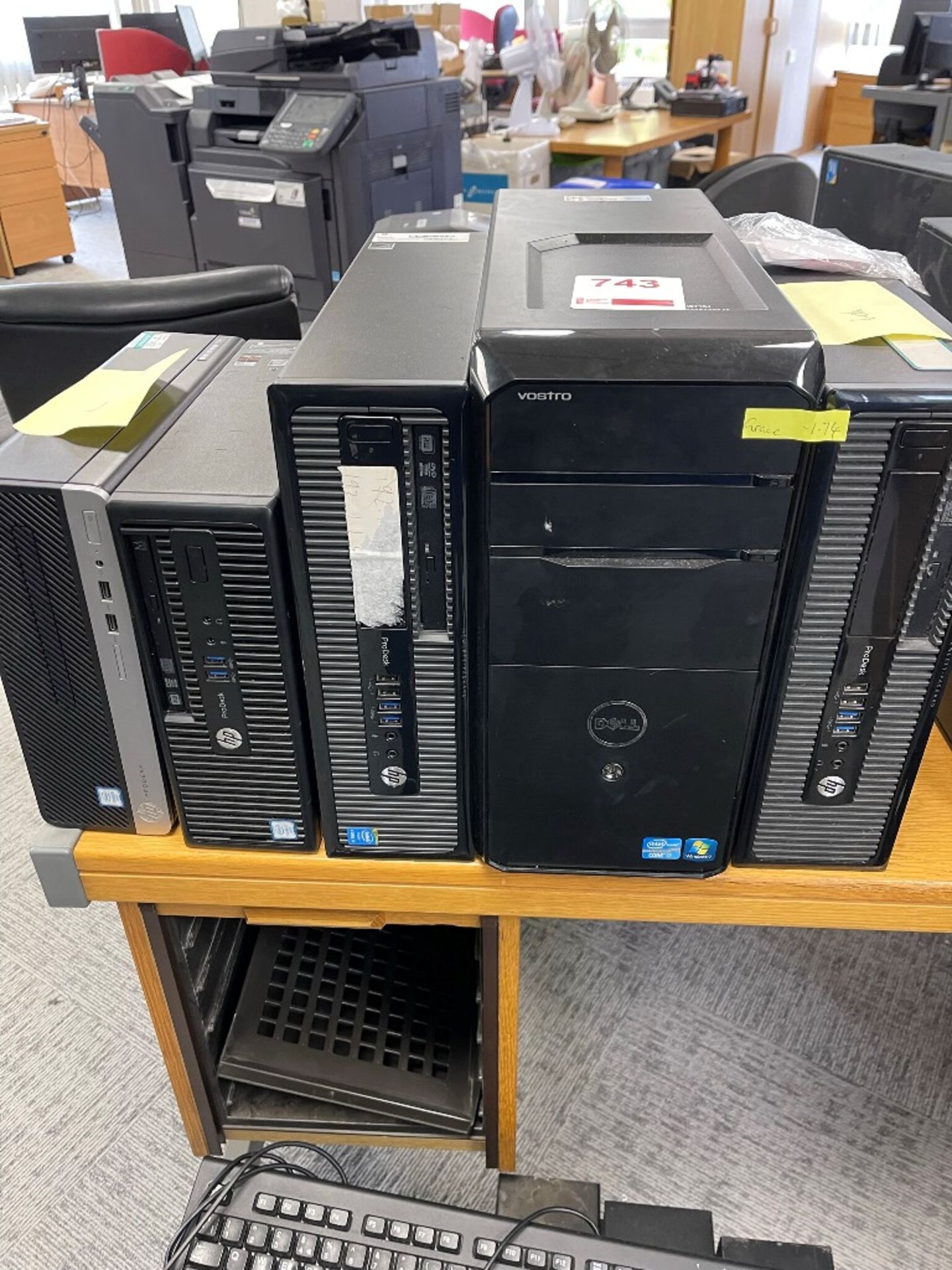 Five various computer towers including HP Pro Desk, Dell Core i7