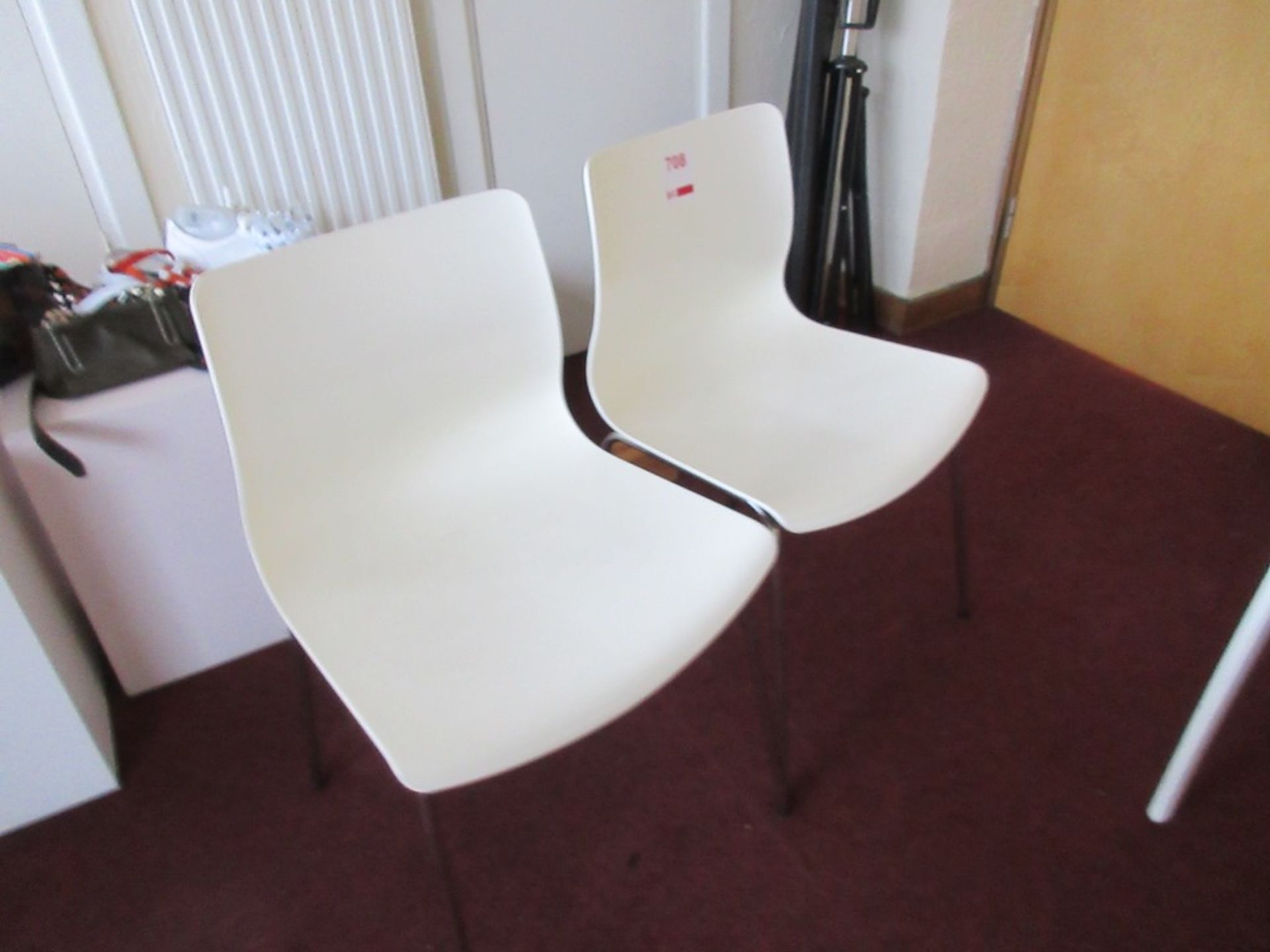 Four chrome frame / plastic chairs