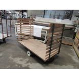 Two metal frame/timber stock trollies