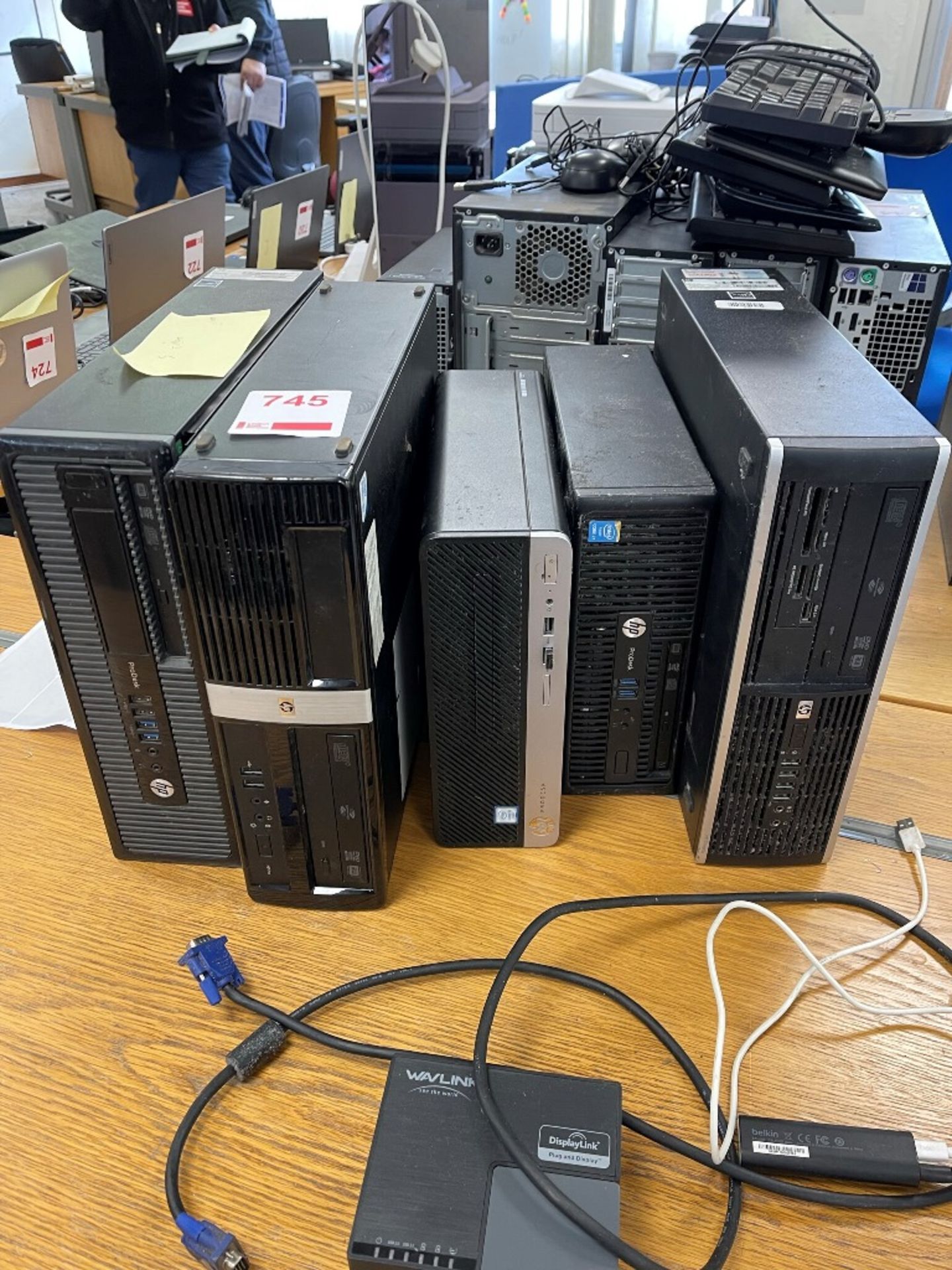 Five various computer towers including HP Pro Desk