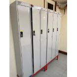 Six rest room lockers on stand