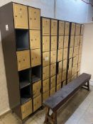 Five Orange and brown multi compartment locker units, as lotted and a timber bench