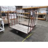 Three metal frame/timber stock trollies