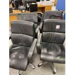 Four leatherette swivel manager's armchairs