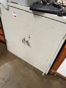 Five various metal cabinets and a white board