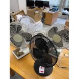 Nine various desk fans