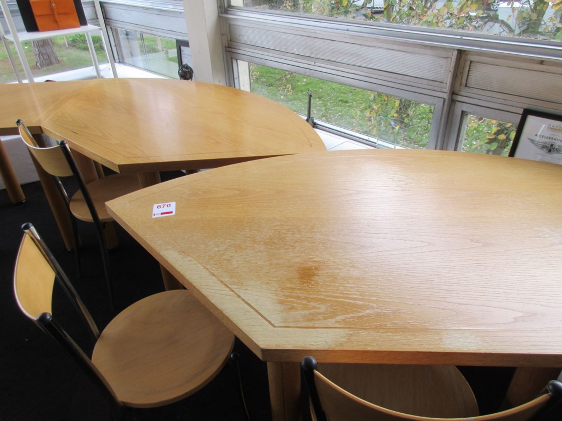 Four light wood effect 4-section circular boardroom table, approx. total dia. 2.4m