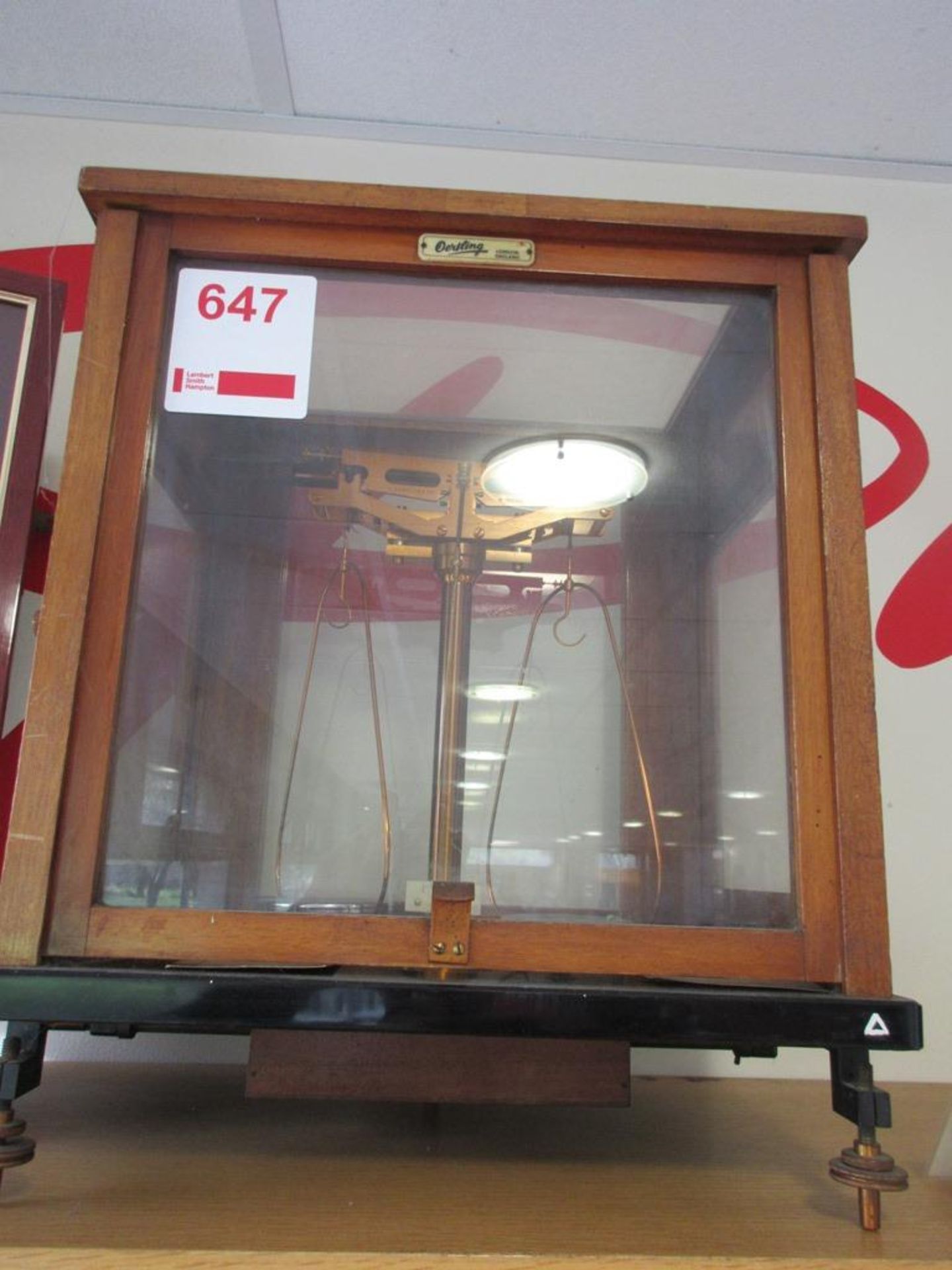 Oertling weighing scales in glass case