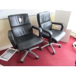 Two leatherette swivel manager's armchairs