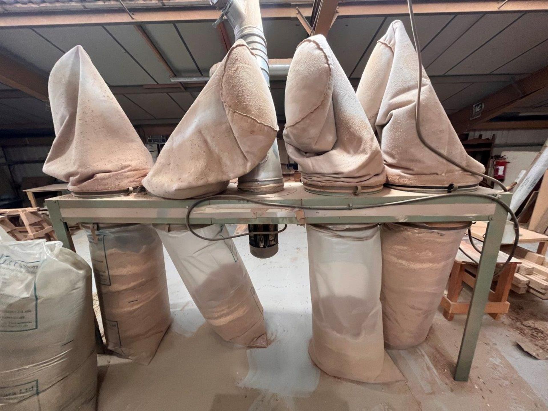 Four bag dust collection unit (Located on mezzanine floor)