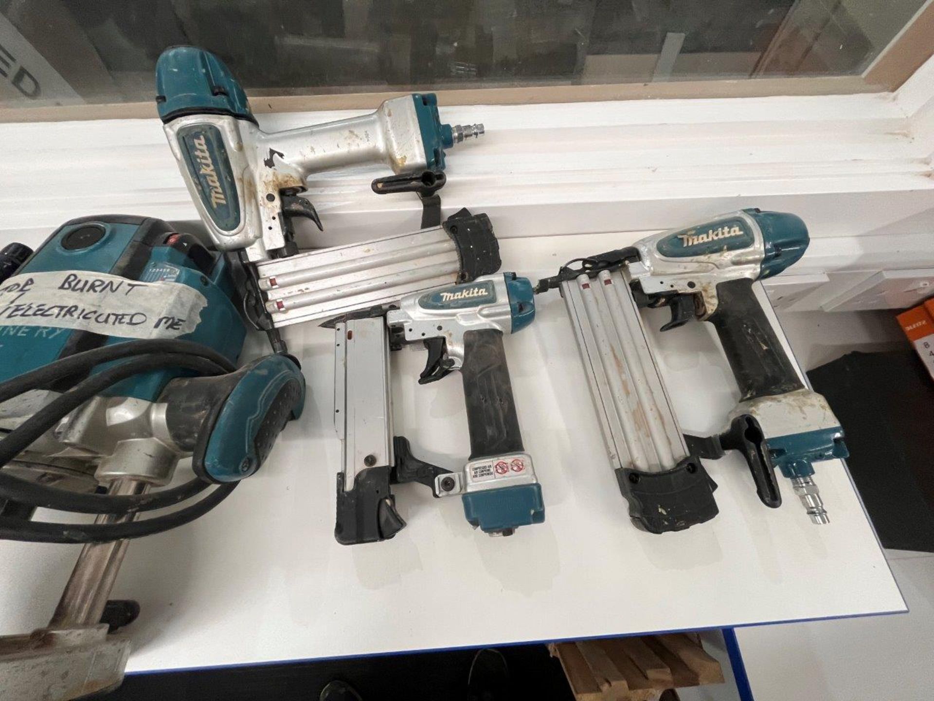 2 x faulty Makita RP2301FC routers & 2 x faulty Makita AF506 nail guns and 1 x faulty Makita AF353 - Image 3 of 4