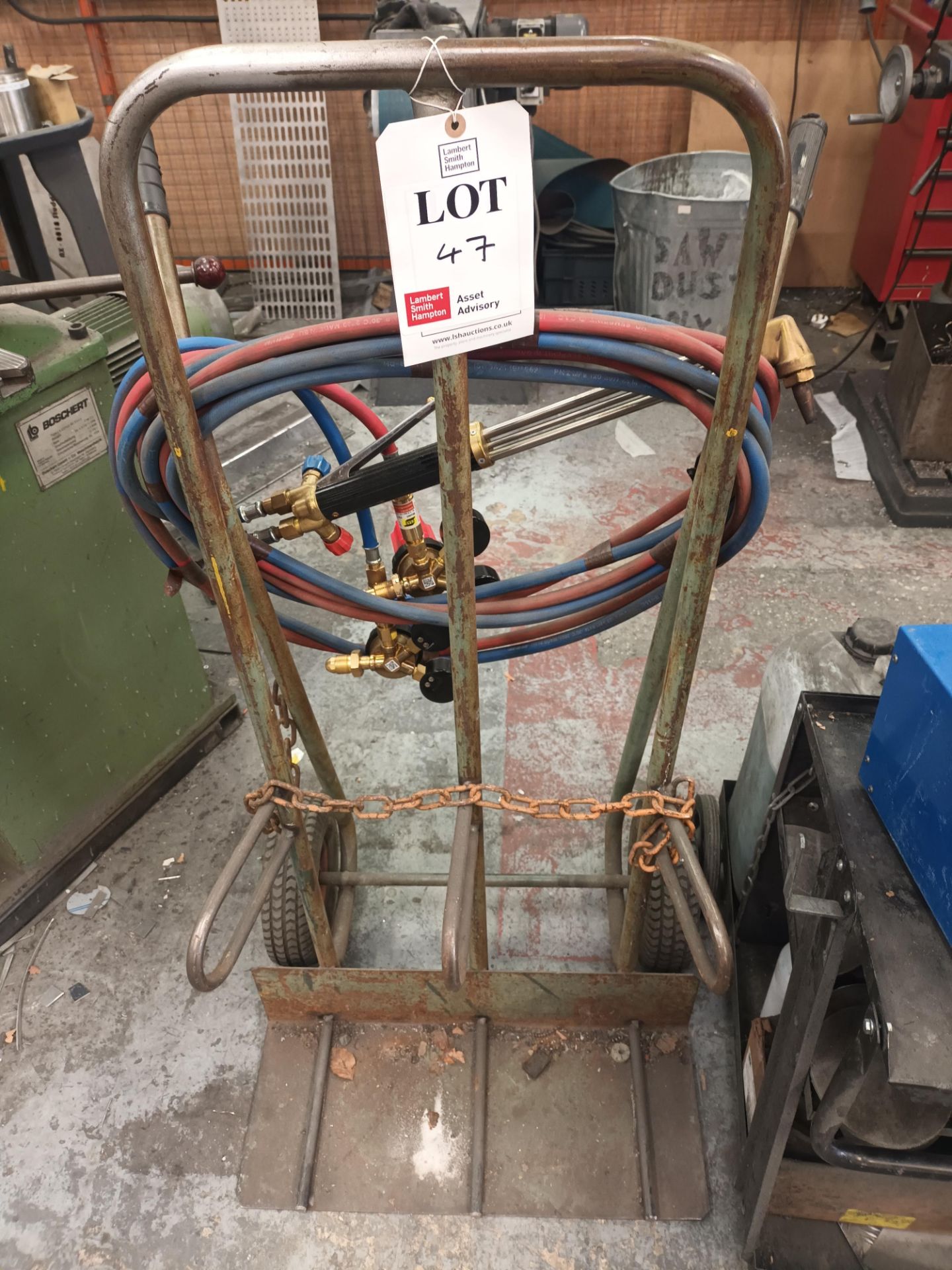 Gas cutting torch with gas regulators and trolley