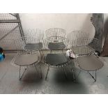 Six metal frame garden chairs with black seat cushion