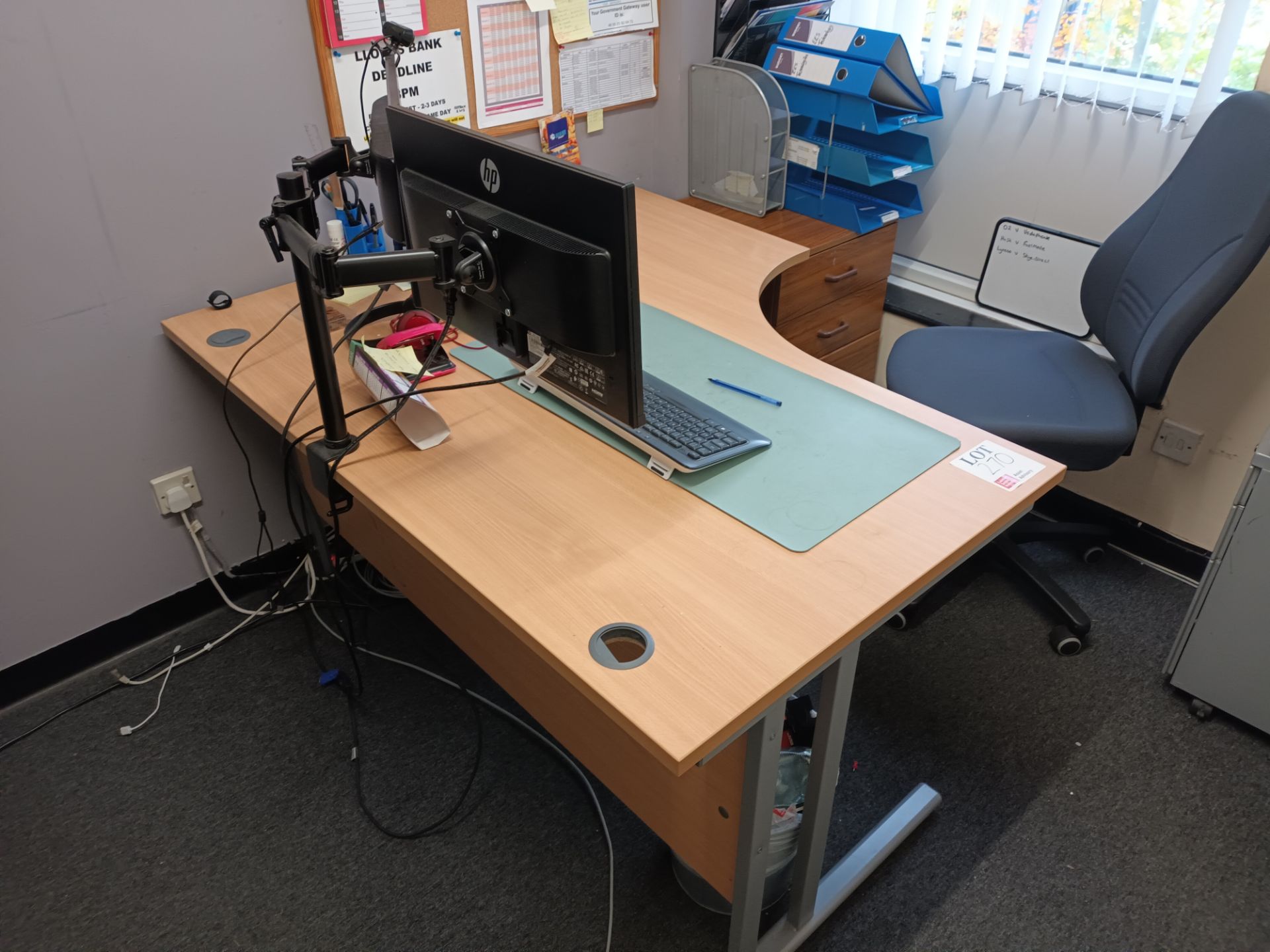 Contents of office to include light wood desk with three drawer pedestal unit, upholstered operator