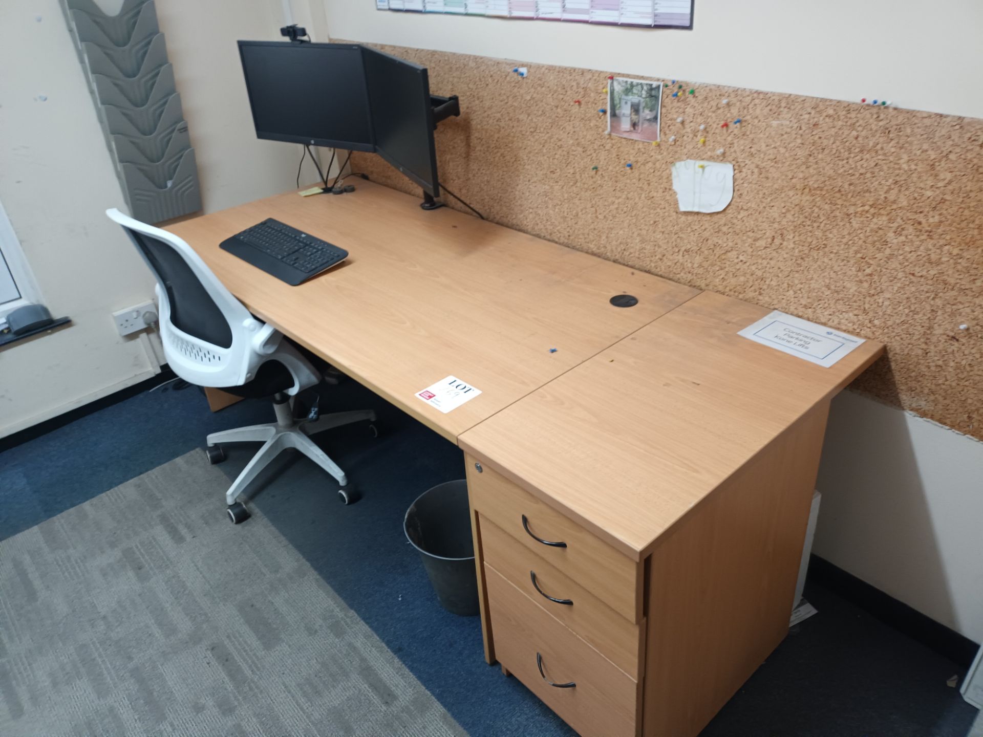 Contents of office to include two various light wood desks with three drawer pedestal units, two ope