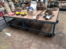 Metal framed workbench on wheels (approximately 250cm (L) x 78cm (H) x 122cm (W)) (Excludes contents