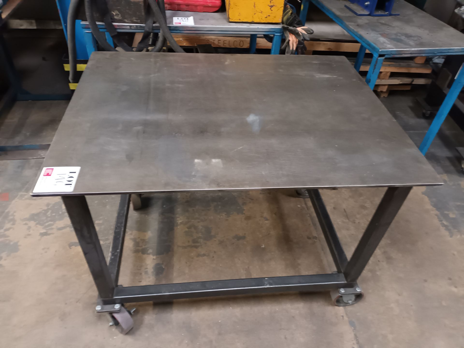 Metal framed table on wheels (120cm (L) x 91cm (H) x 90cm (W)