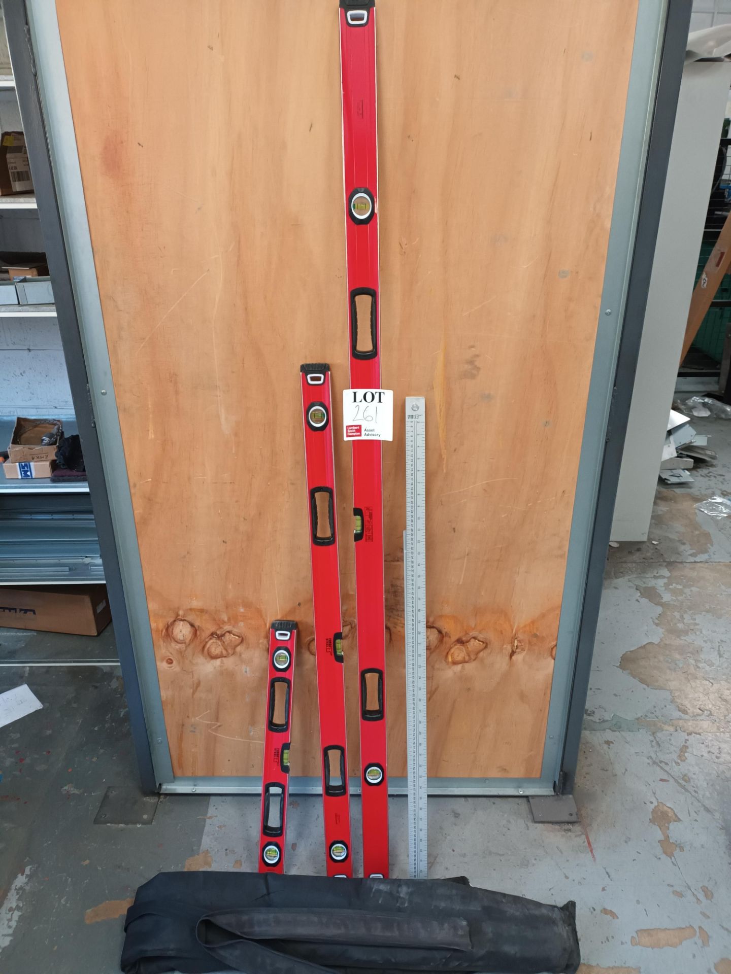 Three various size Forged Steel spirit levels with ruler and carry cases
