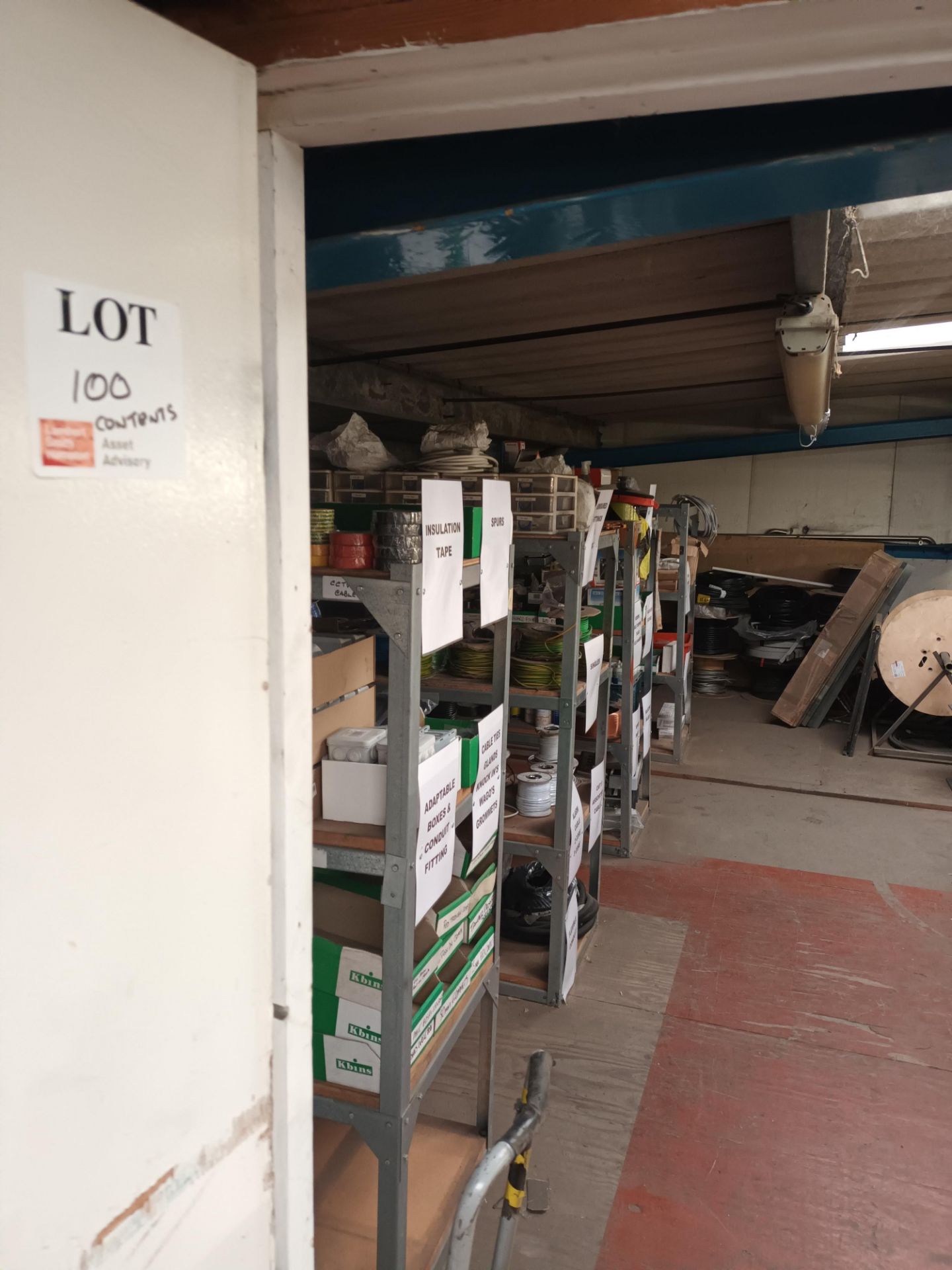 Contents of upstairs stock room to include large quantity of various wire insulation tape, adaptable