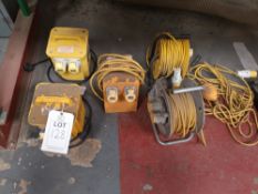 Three various transformers with two cable reels