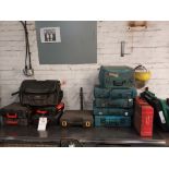 Fourteen various empty tool carry cases