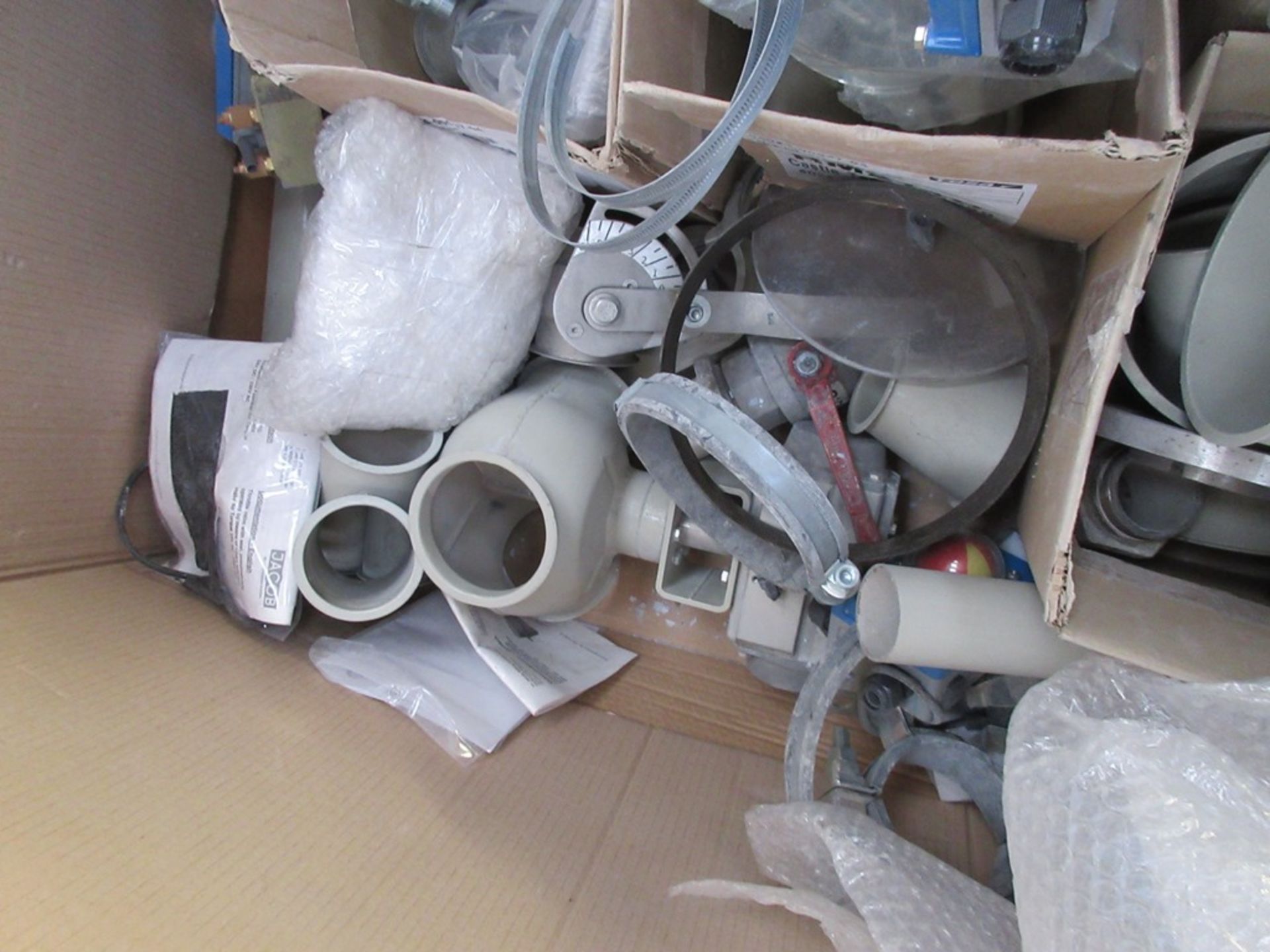 Four pallets of assorted plastic pipe fittings, ducting, steel pipe fittings, brackets, valves, - Image 11 of 14