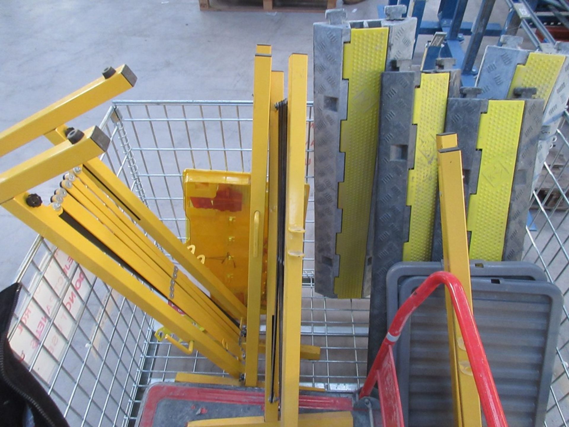 Stillage of four concertina barrier fencing, four safety walkways, mobile transport trolley