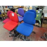 Five various tall operator chairs