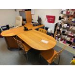 Contents of office to include Wave fronted desk, 3 section roller fronted bookcase, oval shaped tabl