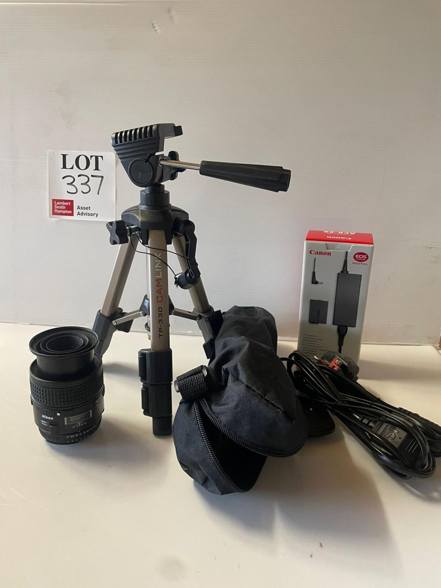 Nikon camera lens with TP330 Camlink tripod