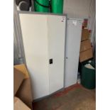 One double door and one single door metal cabinets with various cleaning products (as lotted)