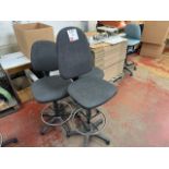 Three grey tall operator chairs