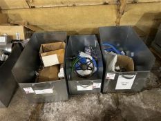 Three storage bins and contents