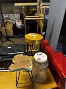 Assorted small stools and jar