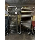 Two metal framed bakery trolleys