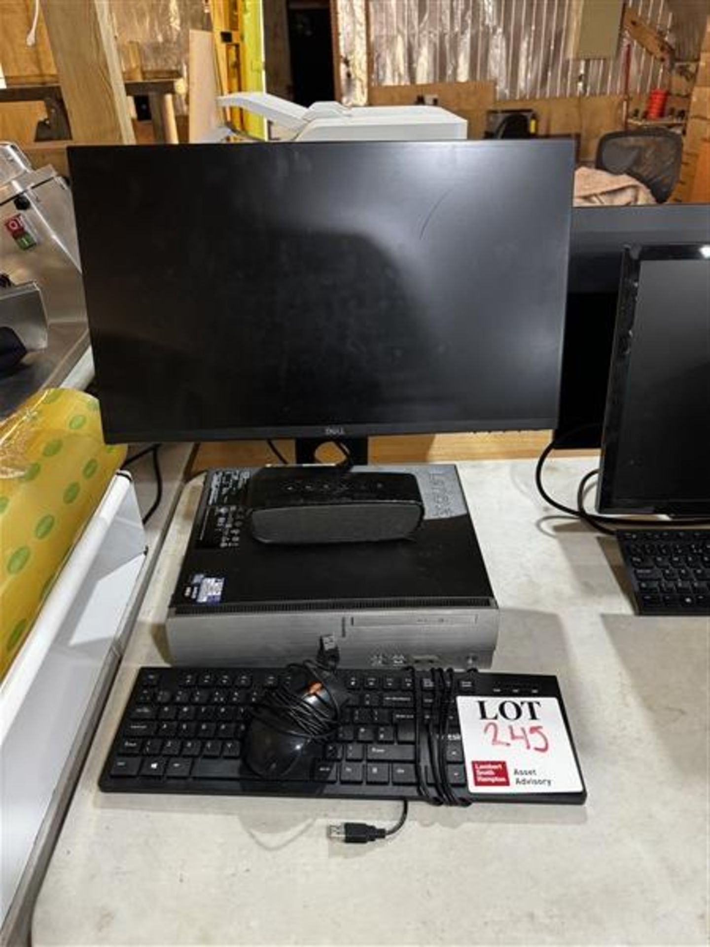 Lenovo PC, Dell monitor, & bluetooth speaker, with keyboard & mouse