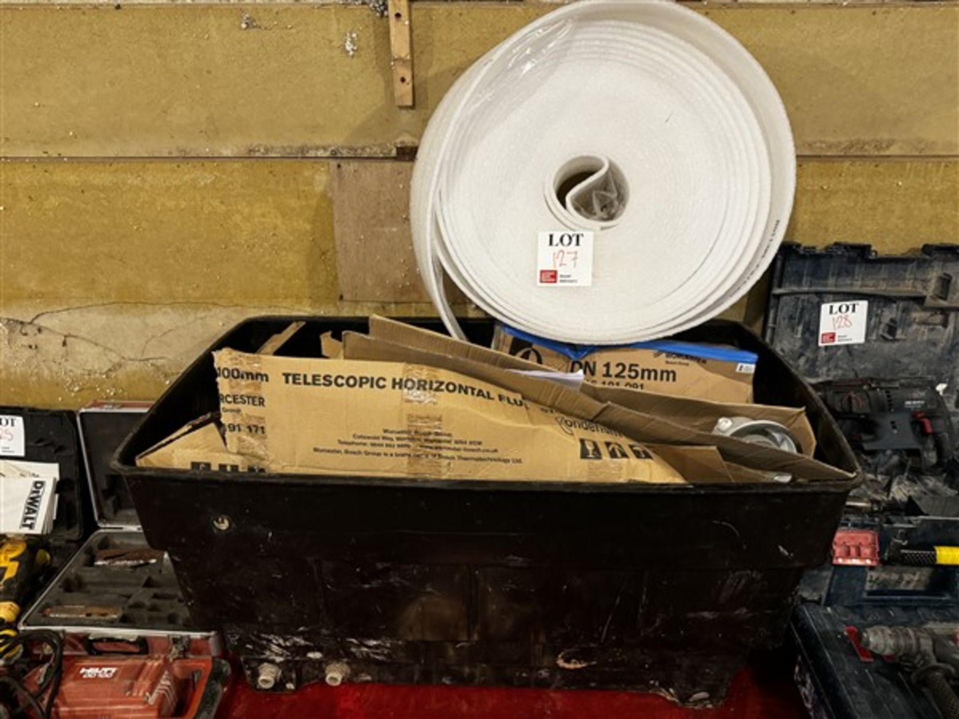 Storage box and contents to include various Worcester and Valliant flues