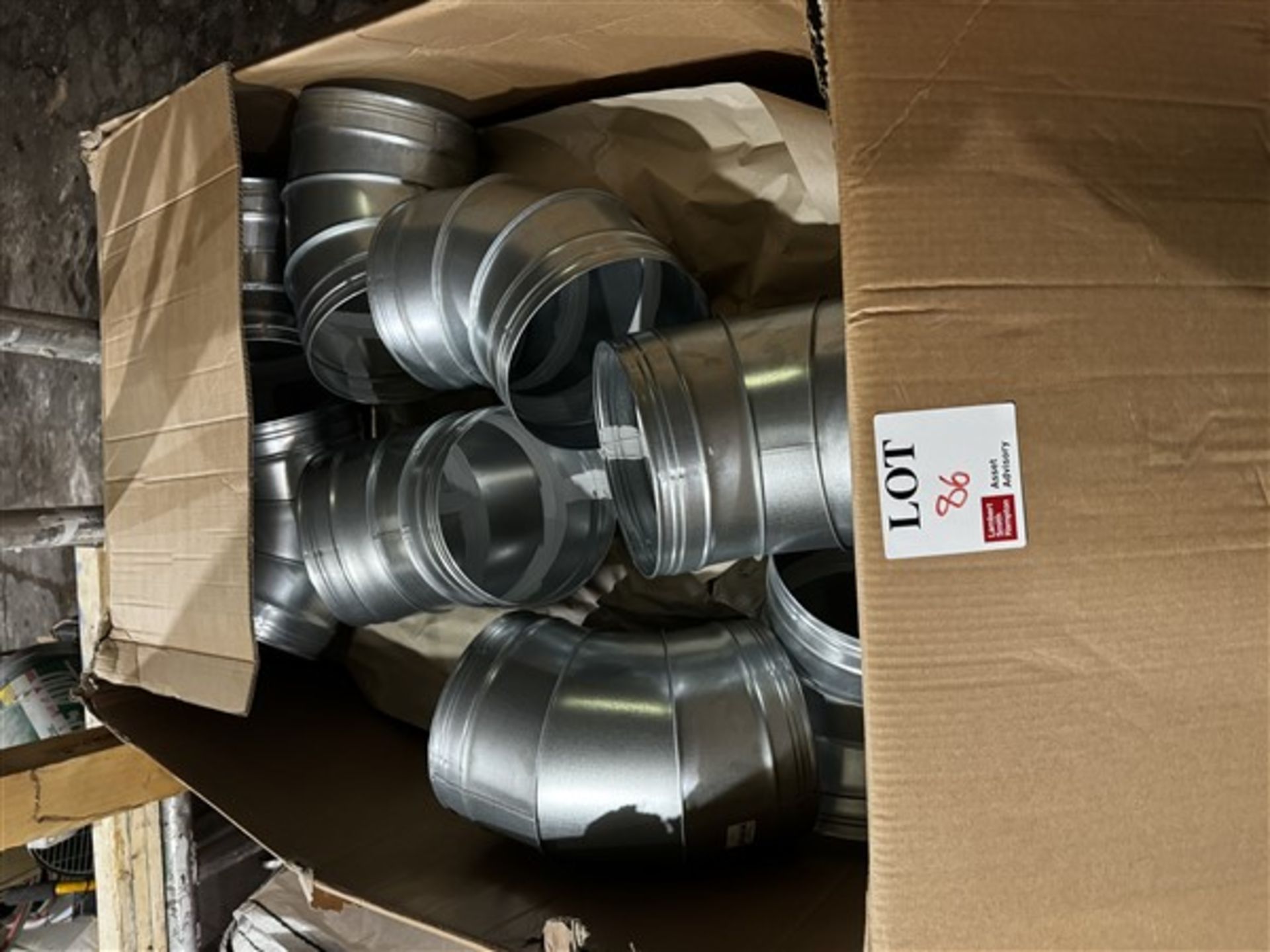 Three boxes of assorted sized ducting bends