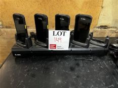 Four Zebra electronic bar code readers with charging stations