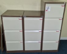 Three coffee & cream filing cabinets (no keys, unlocked)