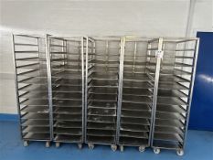 Five 14-shelf stainless steel trolleys with 20 spare shelves