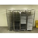 Four 14-shelf stainless steel trolleys with 16 spare shelves