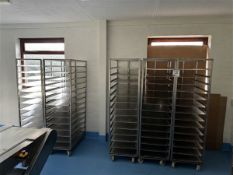 Five 14-shelf stainless steel trolleys with 20 spare shelves