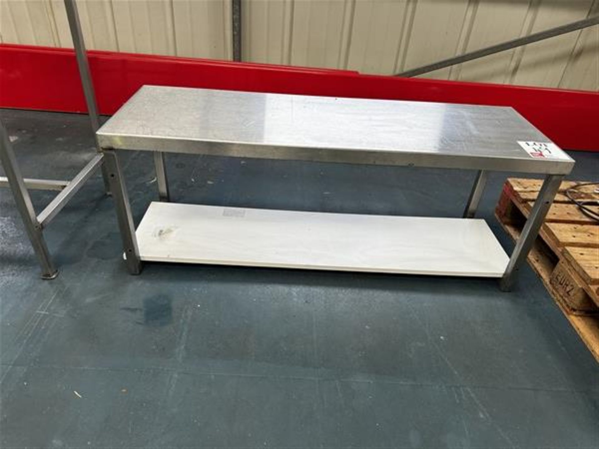 Low standing stainless steel table, H 46cm x L 1.2m x W 40cm