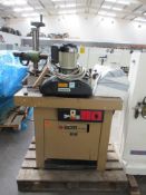 SCM L'Invincible T110 Spindle Moulder together with A Europa Roller Powered Feed (3ph)