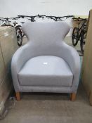 High back raised grey/aqua upholstered armchair together with Bono Deluxe antique style high stool